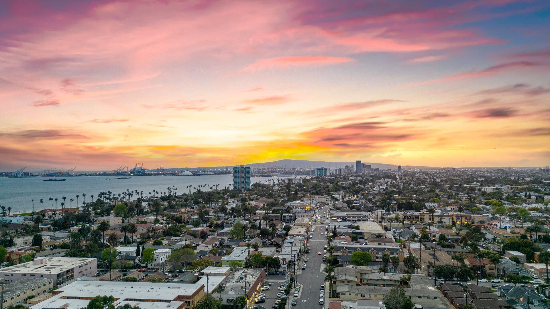 Wide aerial twilight city and ocean view from 226 Grand Ave in Long Beach